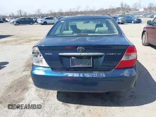 2002 Toyota Camry LE z VIN JTDBE32KX20111362, wystawiony jako IAAI lot #41820475 z przebiegiem 270 091 mil mil oraz . Historia ofert i sprzedaży dostępna na DreamBid. Obrazek 16.