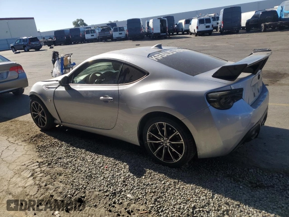 2017 Toyota 86 with VIN JF1ZNAA16H8704163, listed as a Copart auction lot 80139654 with 128,628 mi miles and Salvage Title. Bid and sale history available at carsss.com. Image 2.