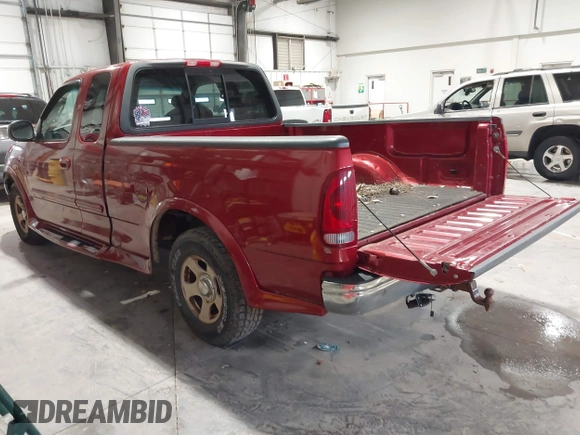 2002 Ford F-150 XL with VIN 1FTRX17L12NA36715, listed as a IAAI auction lot 41850555 with 174,012 mi miles. Bid and sale history available at carsss.com. Image 3.