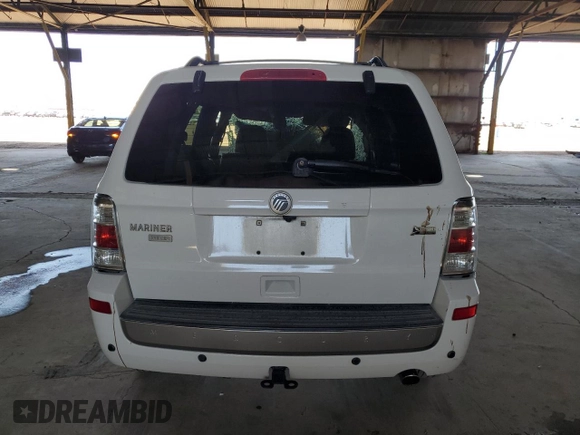 2010 Mercury Mariner Premier with VIN 4M2CN9HG5AKJ26732, listed as a Copart auction lot 62754585 with Not provided miles and Salvage title. Bid and sale history available at DreamBid. Image 6.