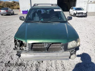 2003 Subaru Forester XS with VIN JF1SG65673H706138, listed as a Copart auction lot 77705784 with 260,423 mi miles and Salvage Title. Bid and sale history available at carsss.com. Image 5.
