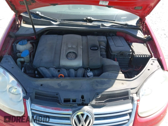 2009 Volkswagen Jetta SE z VIN 3VWRZ71K19M042108, wystawiony jako IAAI lot #41876859 z przebiegiem 187 206 mil mil oraz . Historia ofert i sprzedaży dostępna na DreamBid. Obrazek 10.