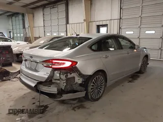 2017 Ford Fusion SE z VIN 3FA6P0H95HR203170, wystawiony jako IAAI lot #41569303 z przebiegiem 143 287 mil mil oraz . Historia ofert i sprzedaży dostępna na DreamBid. Obrazek 4.