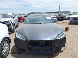 2018 Tesla Model S 75D with VIN 5YJSA1E43JF260547, listed as a IAAI auction lot 42346240 with 89,637 mi miles and . Bid and sale history available at DreamBid. Image 11.