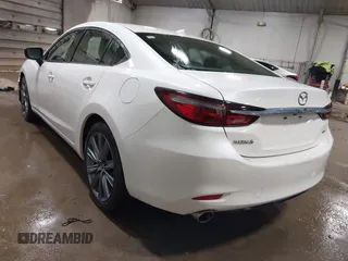 2019 Mazda 6 Grand Touring with VIN JM1GL1TYXK1505439, listed as a IAAI auction lot 41672678 with 52,990 mi miles and . Bid and sale history available at carsss.com. Image 3.
