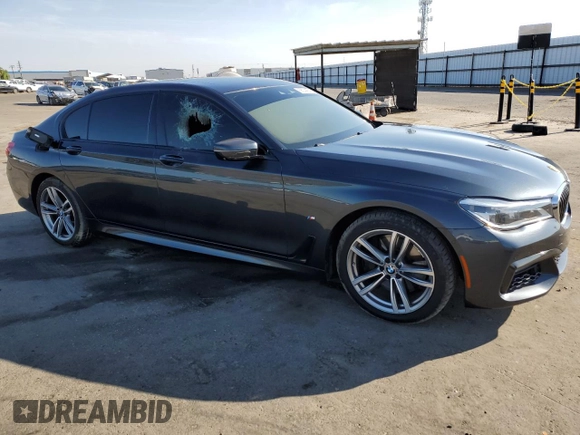2016 BMW 7 Series 750i with VIN WBA7F0C57GGL99332, listed as a Copart auction lot 56144533 with 95,626 mi miles. Bid and sale history available at carsss.com. Image 4.