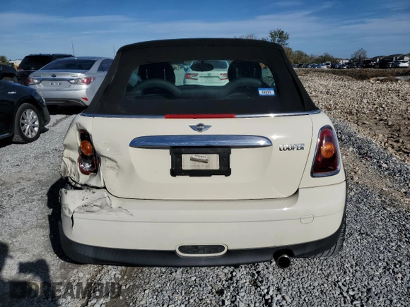 2010 MINI Convertible with VIN WMWMR3C55ATU97172, listed as a Copart auction lot 42726215 with 99,164 mi miles and Salvage Title. Bid and sale history available at DreamBid. Image 6.