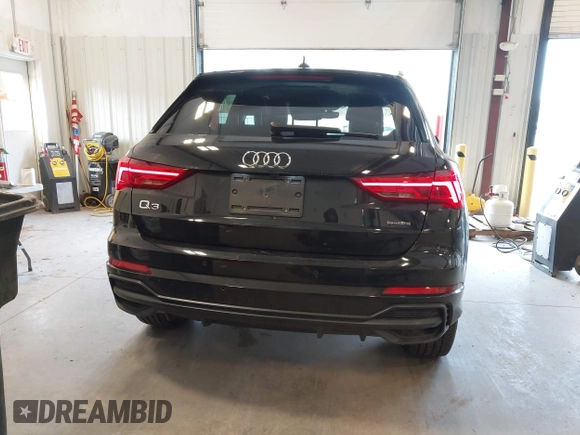 2021 Audi Q3 S line Premium Plus with VIN WA1EECF32M1054629, listed as a IAAI auction lot 41588322 with 33,385 mi miles and . Bid and sale history available at DreamBid. Image 17.