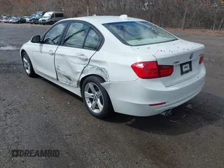 2013 BMW 3 Series 328i xDrive with VIN WBA3B5G5XDNS04574, listed as a IAAI auction lot 41935635 with 135,408 mi miles. Bid and sale history available at carsss.com. Image 3.