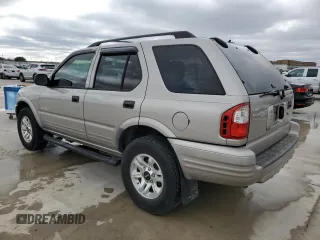 2004 Isuzu Rodeo S with VIN 4S2CK58W344311048, listed as a Copart auction lot 45154765 with 128,733 mi miles and Clean Title. Bid and sale history available at DreamBid. Image 2.