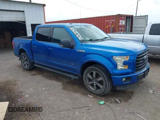2015 Ford F-150 XL with VIN 1FTEW1CG1FKD20413, listed as a IAAI auction lot 41694489 with 147,431 mi miles. Bid and sale history available at carsss.com. Image 1.
