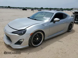 2013 Scion FR-S z VIN JF1ZNAA11D1704767, wystawiony jako Copart lot #52250275 z przebiegiem 82 246 mil mil oraz Czysty tytuł • Clean title. Historia ofert i sprzedaży dostępna na DreamBid. Obrazek 1.
