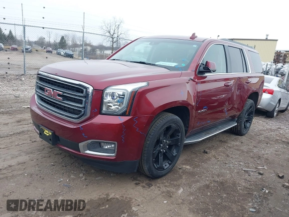 2016 GMC Yukon SLT with VIN 1GKS2BKC0GR339695, listed as a IAAI auction lot 41690832 with 176,119 mi miles and . Bid and sale history available at DreamBid. Image 2.