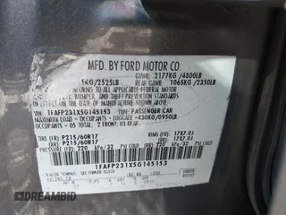 2005 Ford Five Hundred SE z VIN 1FAFP231X5G145153, wystawiony jako IAAI lot #42059747 z przebiegiem 59 114 mil mil oraz . Historia ofert i sprzedaży dostępna na DreamBid. Obrazek 9.