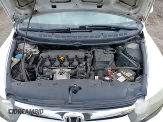 2006 Honda Civic LX with VIN 1HGFA16556L084177, listed as a IAAI auction lot 42053325 with 142,664 mi miles and . Bid and sale history available at DreamBid. Image 10.