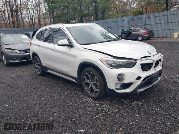 2018 BMW X1 xDrive28i with VIN WBXHT3C36J5L32162, listed as a IAAI auction lot 41802315 with 80,422 mi miles. Bid and sale history available at carsss.com. Image 1.