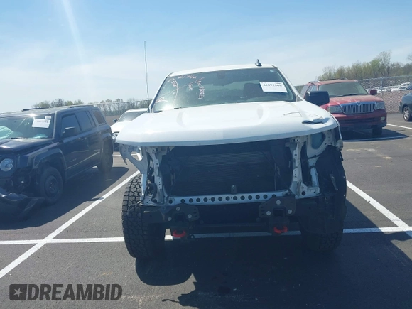2021 Chevrolet Silverado 1500 Custom Trail Boss with VIN 1GCPYCEF1MZ413908, listed as a IAAI auction lot 41891660 with 88,335 mi miles and . Bid and sale history available at DreamBid. Image 12.
