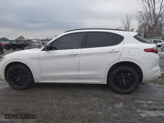2021 Alfa Romeo Stelvio Ti with VIN ZASPAKBNXM7D15764, listed as a IAAI auction lot 41502764 with 48,714 mi miles. Bid and sale history available at carsss.com. Image 14.