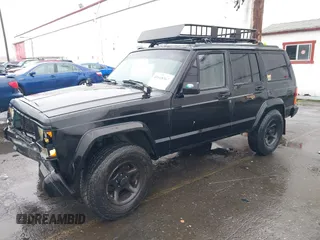 1996 Jeep Cherokee SE with VIN 1J4FJ28S9TL135564, listed as a IAAI auction lot 41618367 with 249,410 mi miles and . Bid and sale history available at DreamBid. Image 17.