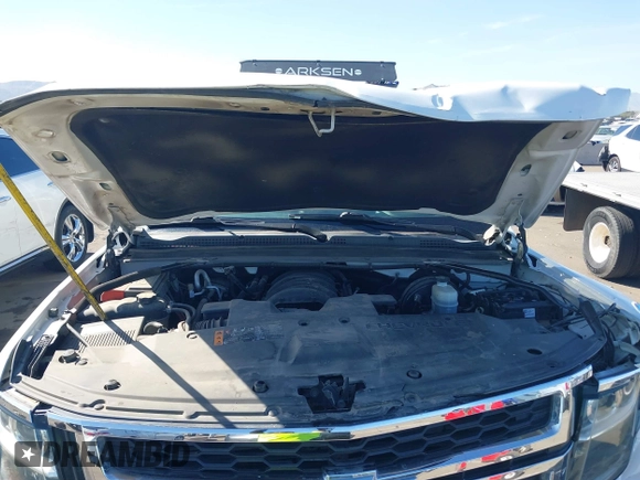 2019 Chevrolet Suburban LT with VIN 1GNSCHKC3KR143942, listed as a IAAI auction lot 41896633 with 153,139 mi miles and . Bid and sale history available at DreamBid. Image 10.
