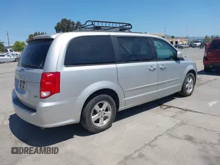 2012 Dodge Grand Caravan SXT with VIN 2C4RDGCG2CR223891, listed as a IAAI auction lot 42189650 with 119,669 mi miles and . Bid and sale history available at DreamBid. Image 4.