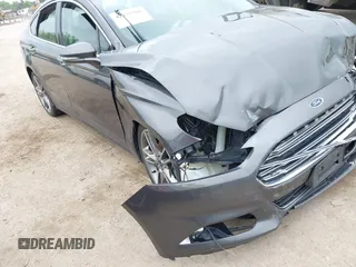 2016 Ford Fusion Titanium with VIN 3FA6P0D97GR133823, listed as a IAAI auction lot 42429708 with 166,105 mi miles and . Bid and sale history available at DreamBid. Image 17.