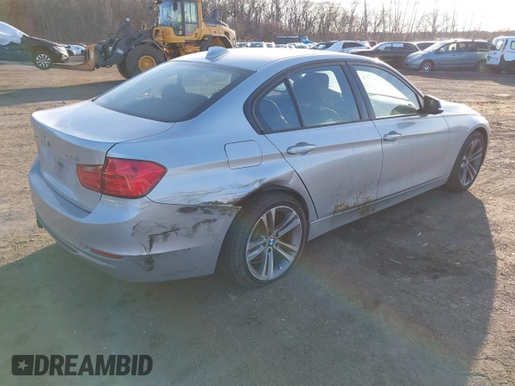2013 BMW 3 Series 328i xDrive with VIN WBA3B3C56DF540744, listed as a IAAI auction lot 41433347 with 162,328 mi miles and . Bid and sale history available at DreamBid. Image 4.