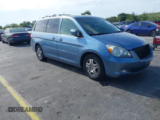 2006 Honda Odyssey EX-L z VIN 5FNRL38766B042913, wystawiony jako IAAI lot #42726237 z przebiegiem 145 718 mil mil oraz . Historia ofert i sprzedaży dostępna na DreamBid. Obrazek 1.