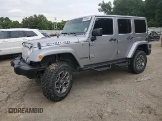 2018 Jeep Wrangler Unlimited Rubicon Recon с VIN 1C4HJWFGXJL840598, выставлен на аукционе Copart как лот 59399595 с пробегом 63 298 миль миль и Списание • Salvage title. История ставок и продаж доступна на DreamBid. Изображение 1.