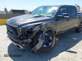 2020 Ram 1500 Rebel with VIN 1C6SRFLT8LN164196, listed as a IAAI auction lot 42538059 with 60,520 mi miles and . Bid and sale history available at DreamBid. Image 6.