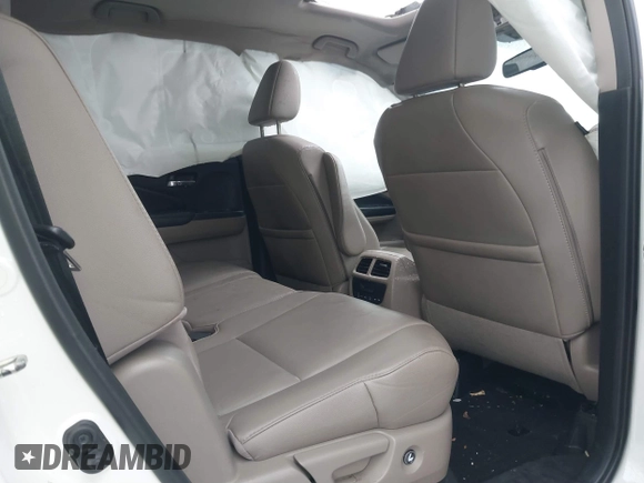 2016 Honda Pilot Touring with VIN 5FNYF6H95GB062089, listed as a IAAI auction lot 41810378 with 74,704 mi miles and . Bid and sale history available at DreamBid. Image 8.