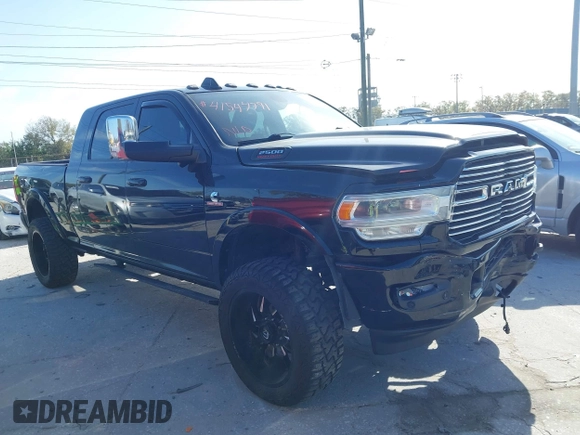 2019 Ram 2500 Laramie with VIN 3C6UR5NL9KG607477, listed as a IAAI auction lot 41712518 with 116,613 mi miles. Bid and sale history available at carsss.com. Image 1.