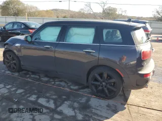 2018 MINI Clubman Cooper S with VIN WMWLN9C57J2E50986, listed as a Copart auction lot 77597404 with 107,606 mi miles and Salvage Title. Bid and sale history available at carsss.com. Image 2.