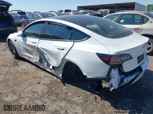 2023 Tesla Model 3 Long Range with VIN 5YJ3E1EB1PF393565, listed as a IAAI auction lot 41656060 with 16,236 mi miles and . Bid and sale history available at DreamBid. Image 3.