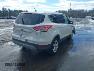 2014 Ford Escape SE with VIN 1FMCU9GX7EUD76778, listed as a IAAI auction lot 41679482 with 136,832 mi miles and . Bid and sale history available at carsss.com. Image 4.