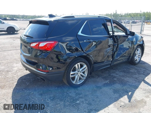 2018 Chevrolet Equinox Premier with VIN 2GNAXNEX1J6313528, listed as a IAAI auction lot 41938985 with 189,244 mi miles and . Bid and sale history available at DreamBid. Image 4.