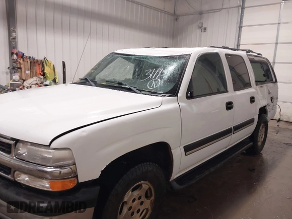 2005 Chevrolet Suburban LT z VIN 1GNFK16Z85R181312, wystawiony jako IAAI lot #41013350 z przebiegiem 270 753 mil mil oraz . Historia ofert i sprzedaży dostępna na DreamBid. Obrazek 6.