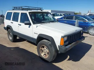 1996 Jeep Cherokee SE z VIN 1J4FJ28S0TL328637, wystawiony jako IAAI lot #42078412 z przebiegiem 333 223 mil mil oraz . Historia ofert i sprzedaży dostępna na DreamBid. Obrazek 1.