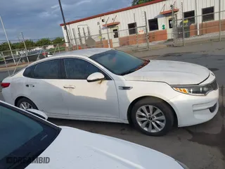 2016 Kia Optima EX with VIN 5XXGU4L38GG008436, listed as a IAAI auction lot 42094498 with 134,781 mi miles. Bid and sale history available at carsss.com. Image 13.