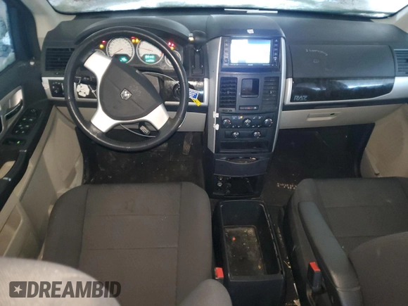 2010 Dodge Grand Caravan Crew with VIN 2D4RN6DX7AR446546, listed as a Copart auction lot 42484005 with 118,104 mi miles and Salvage Title. Bid and sale history available at DreamBid. Image 8.