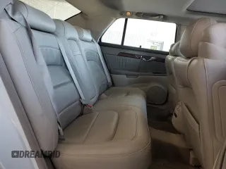 2004 Cadillac DeVille DHS z VIN 1G6KE54Y14U248539, wystawiony jako Copart lot #51995685 z przebiegiem 149 571 mil mil oraz Czysty tytuł • Clean title. Historia ofert i sprzedaży dostępna na DreamBid. Obrazek 10.