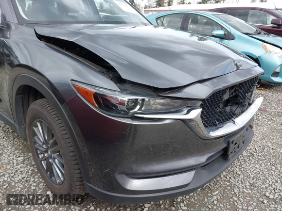 2021 Mazda CX-5 Touring with VIN JM3KFBCM2M0484011, listed as a IAAI auction lot 41825954 with 48,958 mi miles. Bid and sale history available at carsss.com. Image 6.