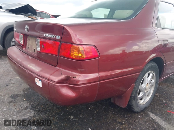 2000 Toyota Camry CE z VIN JT2BG22K3Y0521541, wystawiony jako IAAI lot #42074772 z przebiegiem 144 587 mil mil oraz . Historia ofert i sprzedaży dostępna na DreamBid. Obrazek 17.