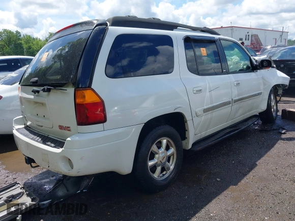 2003 GMC Envoy SLT z VIN 1GKES16S136235222, wystawiony jako IAAI lot #42245115 z przebiegiem Nie podano mil oraz . Historia ofert i sprzedaży dostępna na DreamBid. Obrazek 4.