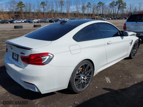 2019 BMW M4 with VIN WBS4Y9C5XKAG67446, listed as a IAAI auction lot 41669865 with 103,230 mi miles. Bid and sale history available at carsss.com. Image 4.