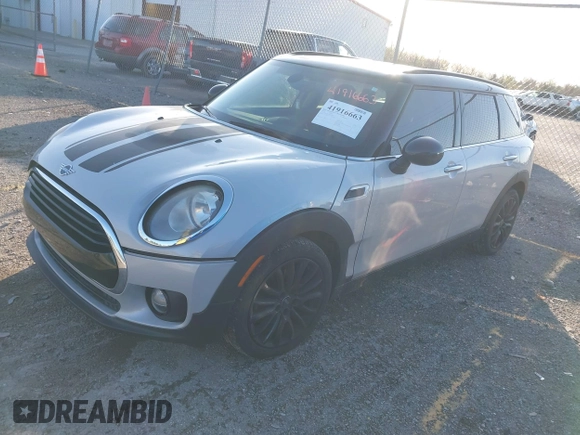 2019 MINI Clubman Cooper with VIN WMWLN5C56K2E34756, listed as a IAAI auction lot 41916663 with 85,860 mi miles and . Bid and sale history available at DreamBid. Image 17.