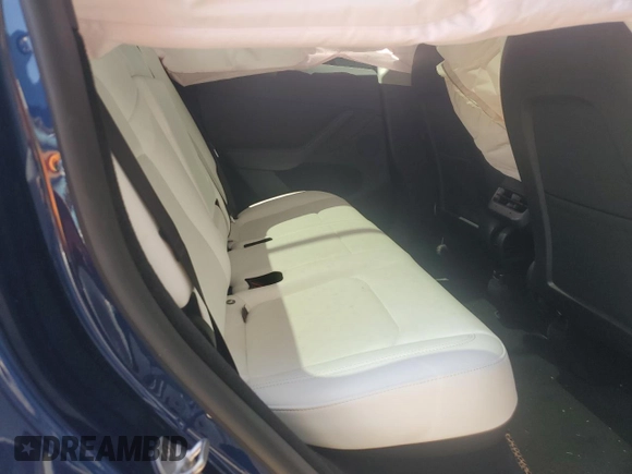 2023 Tesla Model Y Long Range with VIN 7SAYGDEE7PA112865, listed as a Copart auction lot 54626685 with 10,720 mi miles and Salvage Title. Bid and sale history available at DreamBid. Image 10.