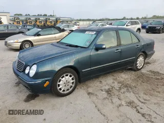 2000 Mercedes-Benz E-Class with VIN WDBJF65J1YB103093, listed as a Copart auction lot 51587325 with 208,350 mi miles and Salvage Title. Bid and sale history available at carsss.com. Image 1.