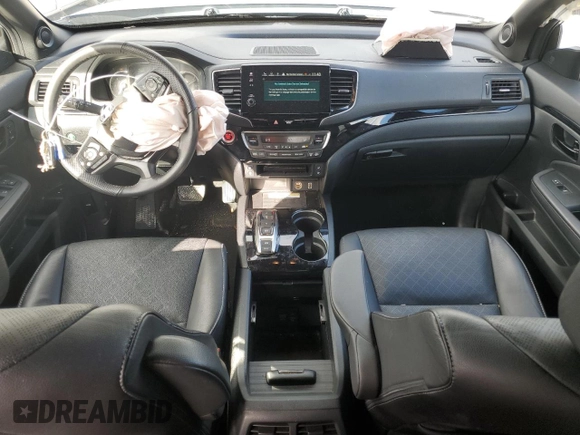 2023 Honda Passport Elite with VIN 5FNYF8H05PB013276, listed as a Copart auction lot 87323504 with 27,360 mi miles and Salvage Title. Bid and sale history available at carsss.com. Image 8.