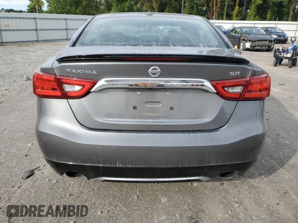 2017 Nissan Maxima Platinum with VIN 1N4AA6AP2HC415210, listed as a Copart auction lot 75491674 with 107,023 mi miles and Salvage title. Bid and sale history available at DreamBid. Image 6.